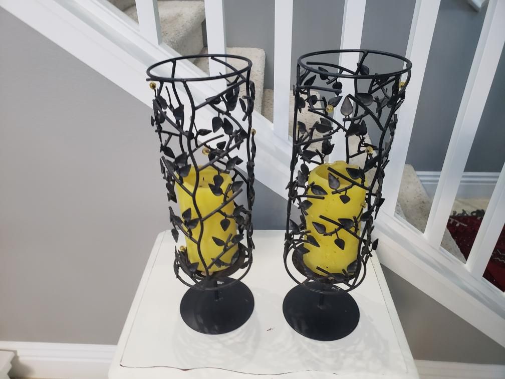 Beautiful Metal Tall Candles Holders With Yellow Candles 