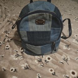 Michael Kor Denim Vintage Backpack  In Really Good Condtion.