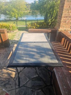 Outdoor patio table
