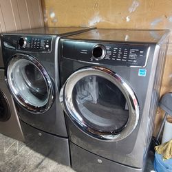 Electrolux Front Loading Washer And Stackable Gas Dryer Set With Pedestals 