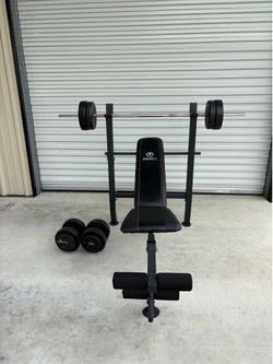Marcy adjustable bench, solid barbell and adjustable dumbbells $190
