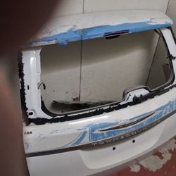 Tapa Trasera Town & Country 2012 - 2016