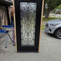 36x80 Front Door Solid Wood. With Iron Design  And Flemish Glass.