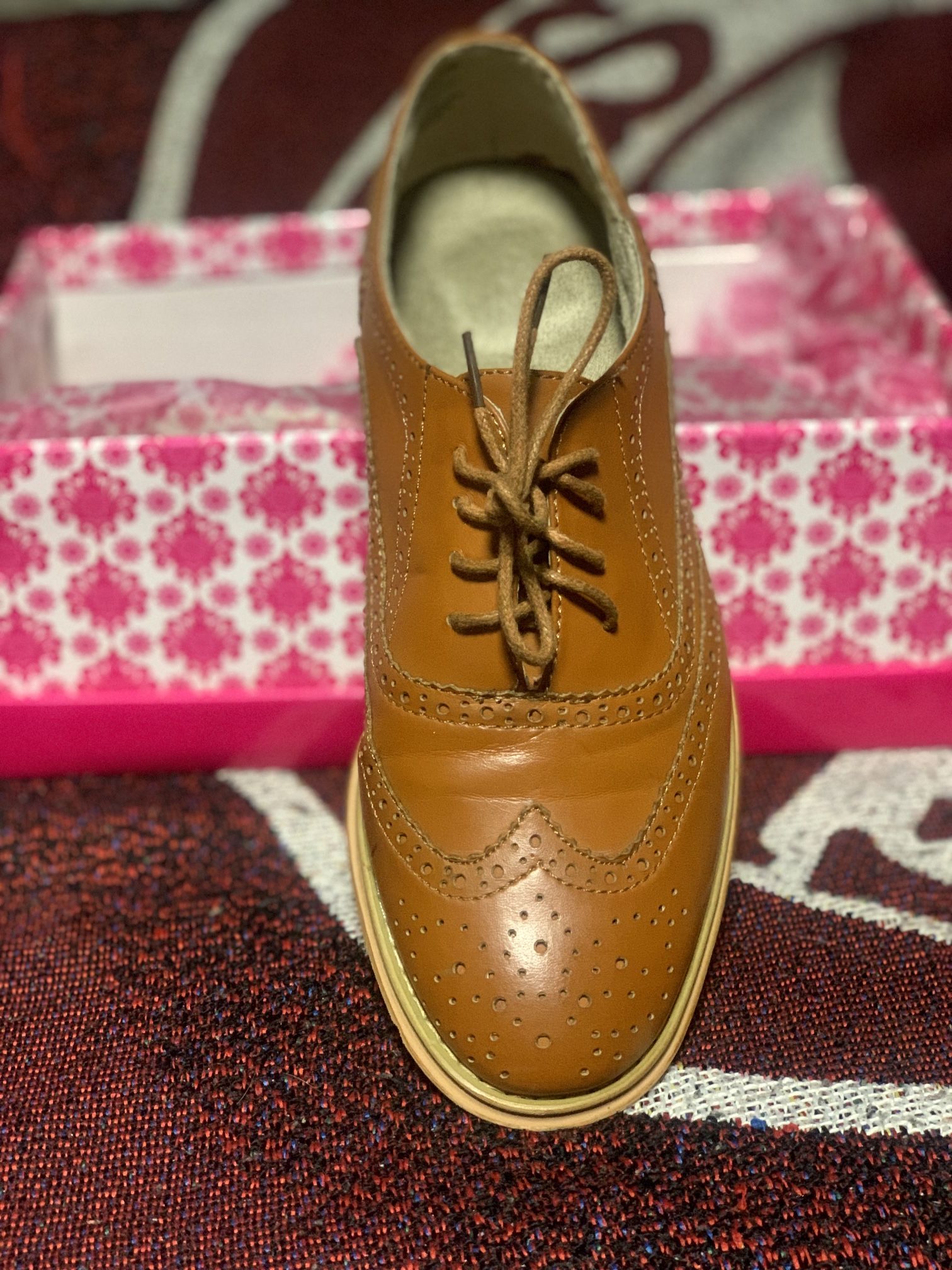 Brown woman’s Oxfords 