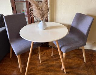 Dining table with two chairs