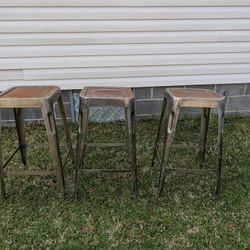 Three  metal bar stools. All three need paint. One has loose bar on bottom. Selling all together for very cheap. Obo