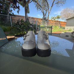 Size 10  Dolls kill Platform Clogs 