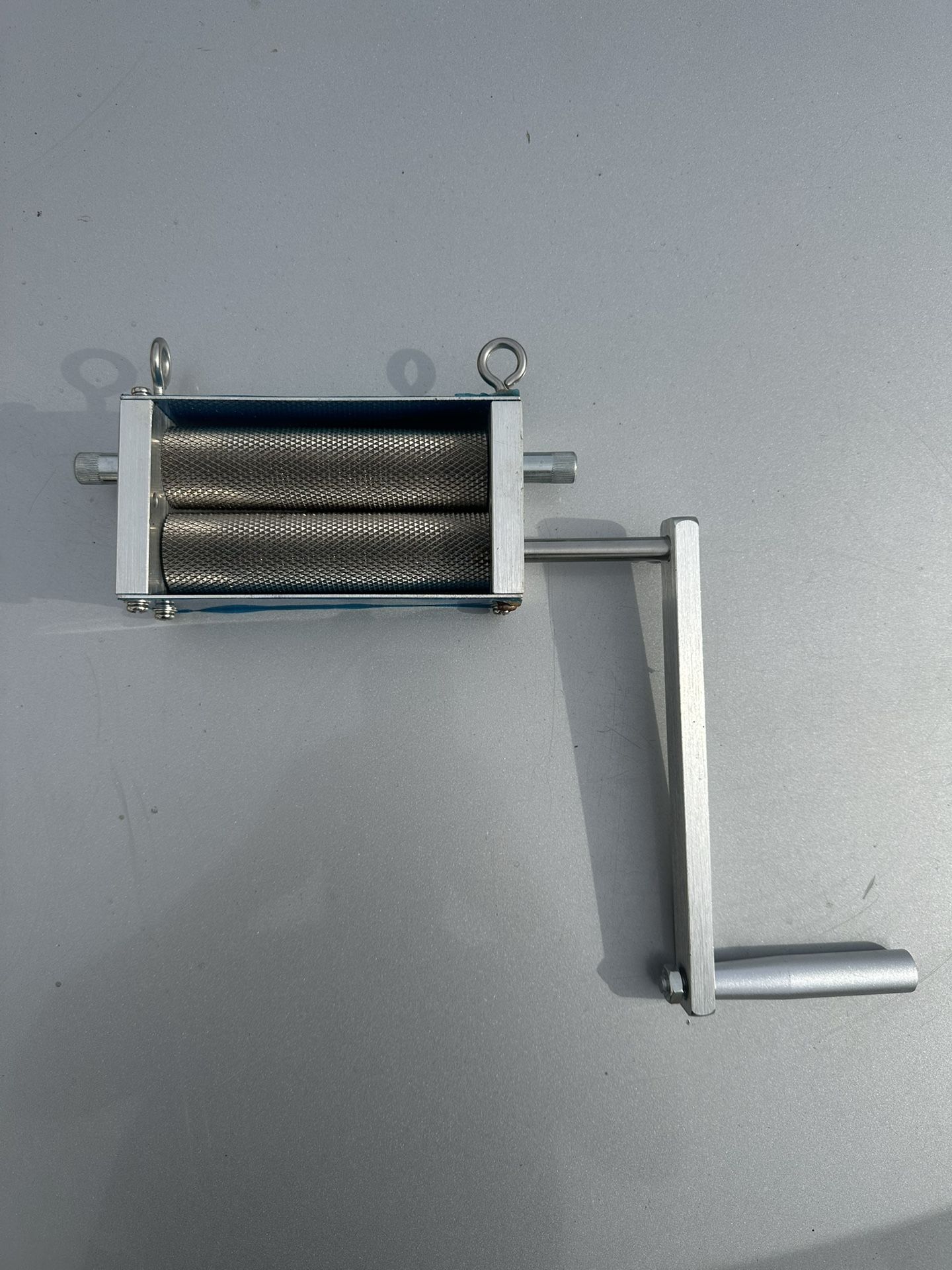 manual two roller grain mill or malt grinder, often used for home brewing