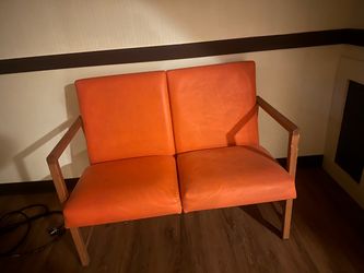 Orange Vinyl Two-Seat Loveseat with Wood Frame