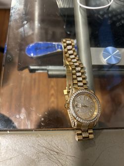 gold watch /throw a price 