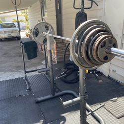 Squat Rack + Barbell + Plates