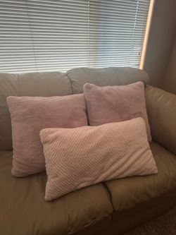 Bundle of pink throw pillows