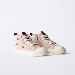 High-top sneakers with strawberry embroidery.