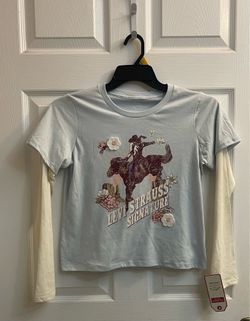 Brand new Girls light blue & burgundy long sleeve t-shirts sizes S & XL $6.00 each