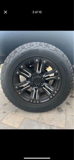 Continental TerrainContact A/T All Terrain 265/60R20 Black Rhino Rims