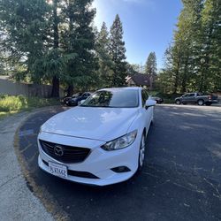 White Mazda 2015 