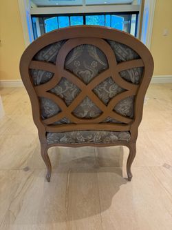Two elegant French style arm chairs