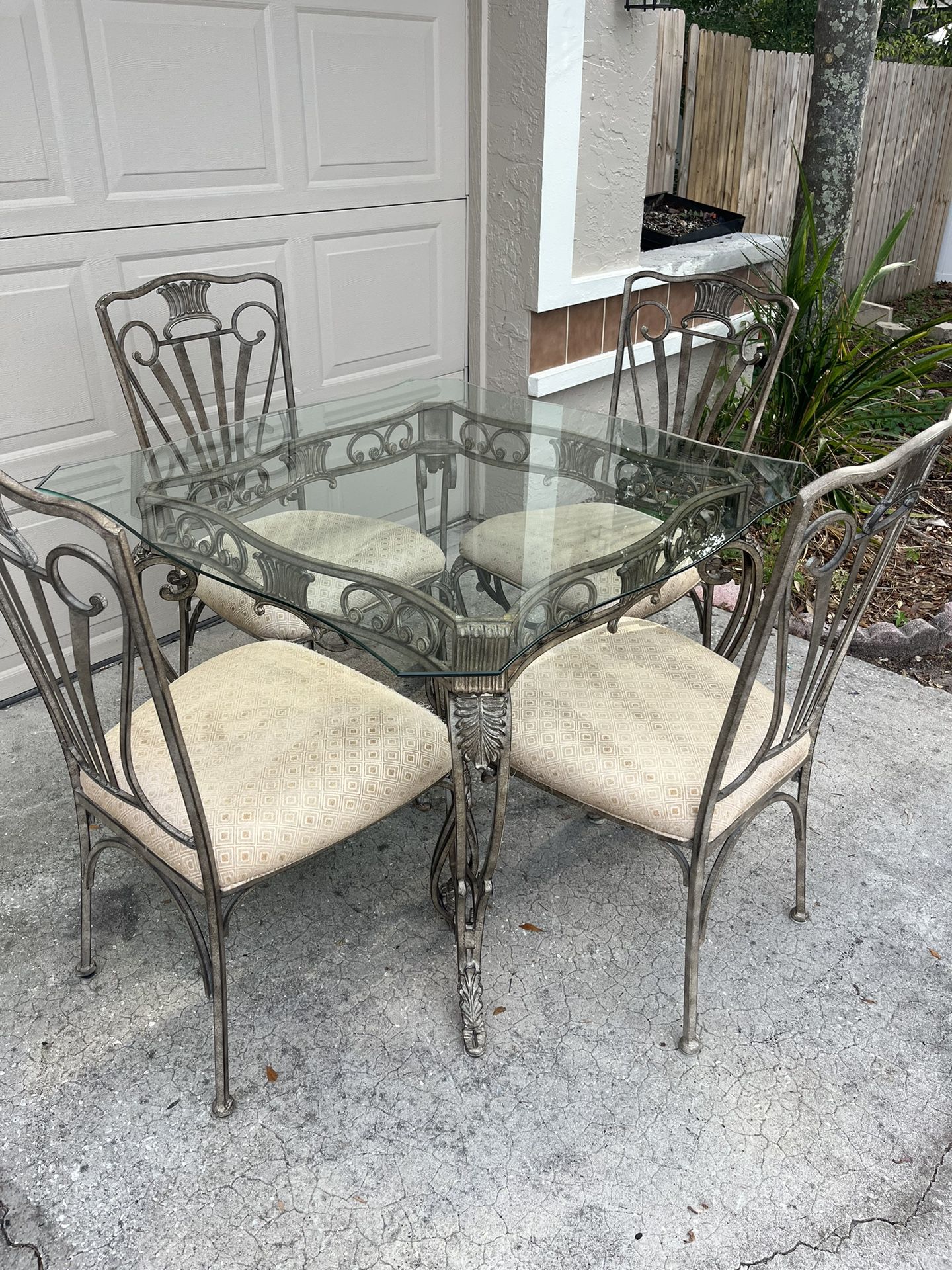BEAUTIFUL GLASS DINING TABLE WITH IRON BASE