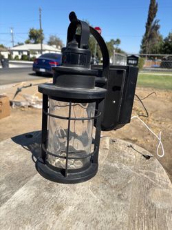 Motion detecting porch light
