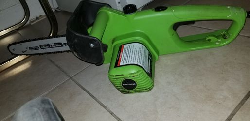 Lime green chainsaw