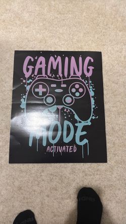 Gaming mode, super cool, blue controller, and pink poster Gaming mode, super cool, blue controller, and pink poster