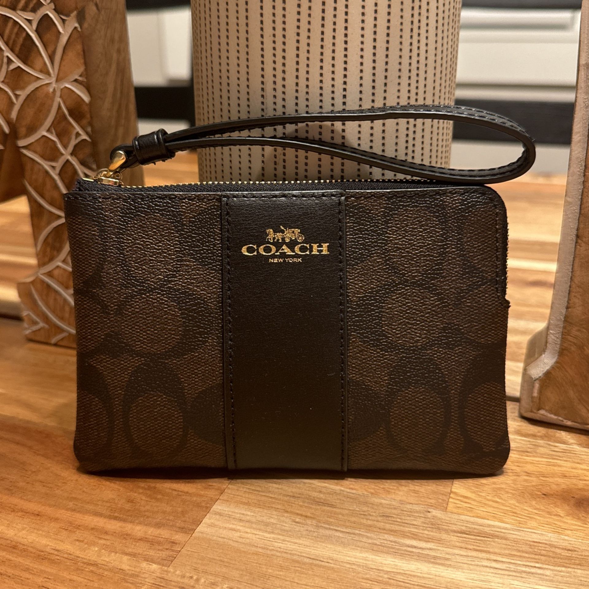 Coach Corner Zip Wristlet In Signature Canvas