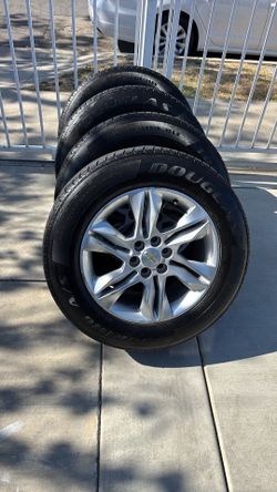 Chevy blazer rims and tires(60%)