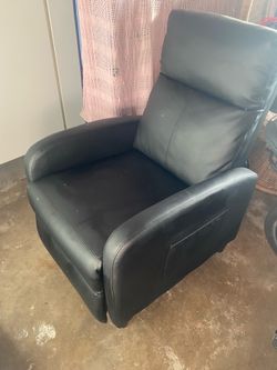 Practically new small Black Recliner