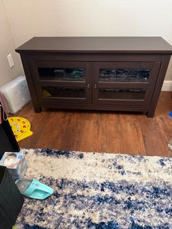 Dark Brown Wood TV Stand with Glass Doors