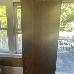 Tall Brown Cabinet