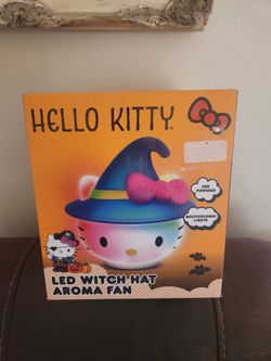 HELLO KITTY LED WITCH HAT AROMA FAN. $25 EACH. I HAVE 2