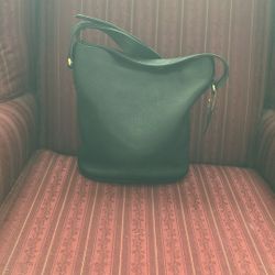 Coach Bucket bag Very Roomy Holds A lot Long Adjustable Strap. 