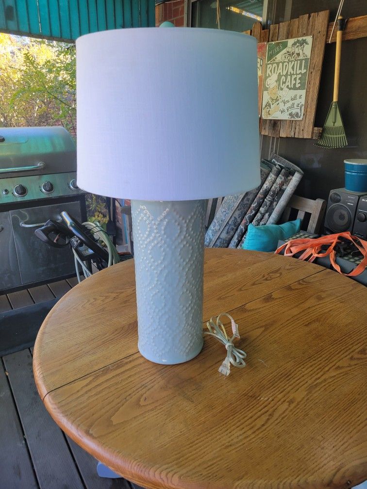 Modern blue ceramic lamp.