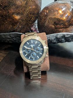 Fossil Decker Multifunción Dorado