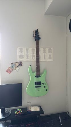Sea Foam Green Mitchell Double-Cutaway Electric Guitar