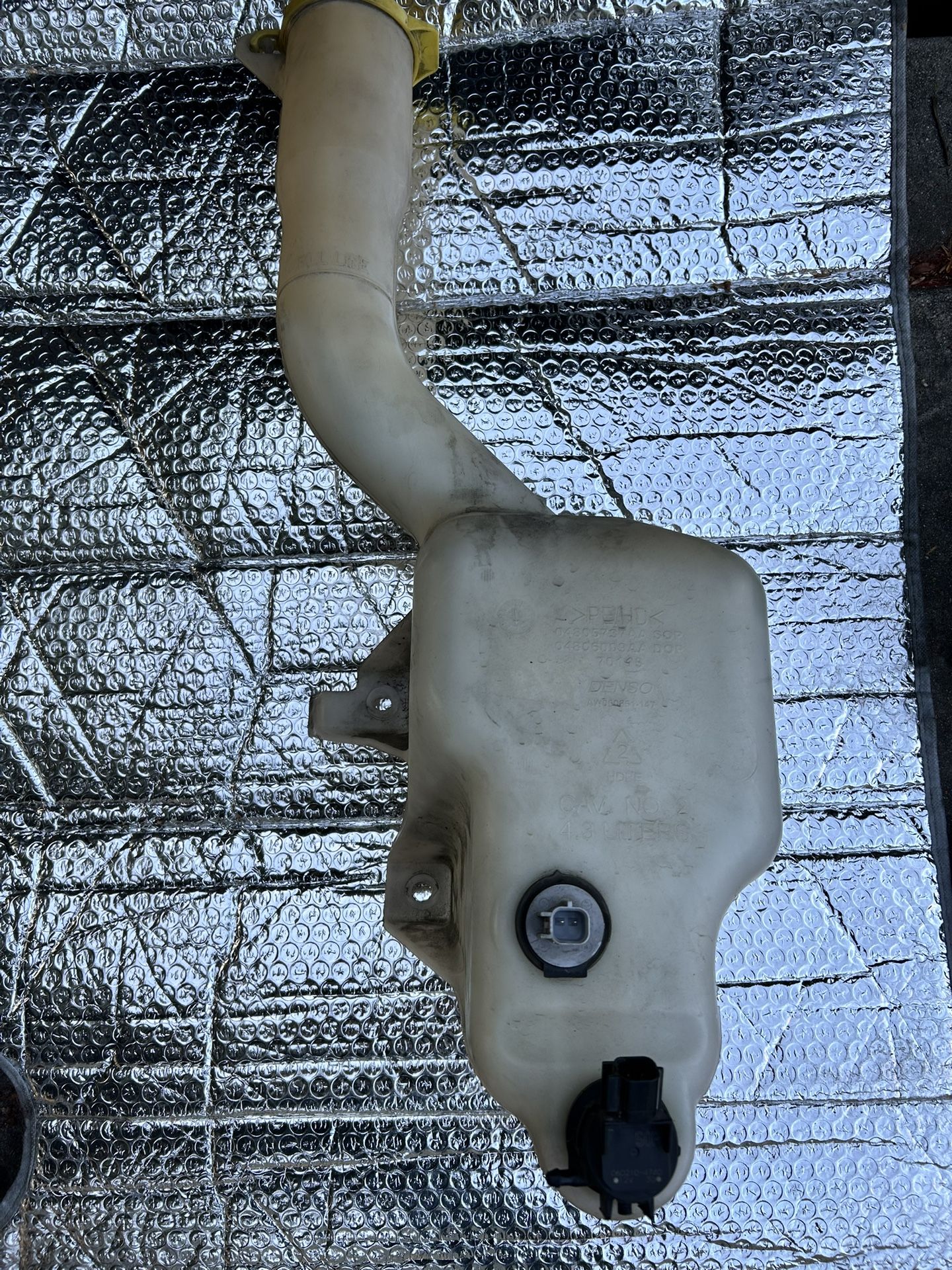 windshield washer reservoir From Chrysler 300.