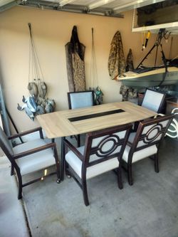 Dining Table Set..Table ..64 by 40 with 5 Matching Leather Chairs