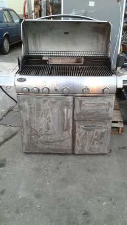 Used Gas Grill. Converted to Charcoal Grill Sold as is . Large Cooking Surface Space . Excellent for SF Afternoon BBQ. Deliver for Small Fee