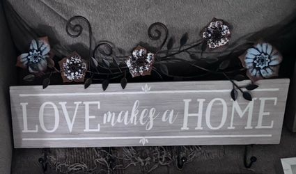 Love Makes a Home Wall Sign with Hooks