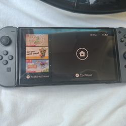 Nintendo Switch OLED, with joycons, carry case.