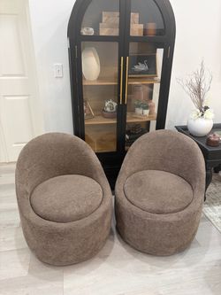 2 small swivel chairs