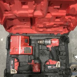 Milwaukee battery powered drills in case