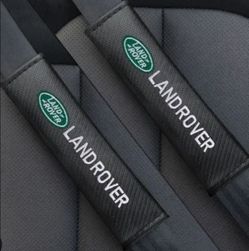 2 new Land rover seat belt shoulder pads universal fit projector door lights sold separately SHIPPING AVAILABLE