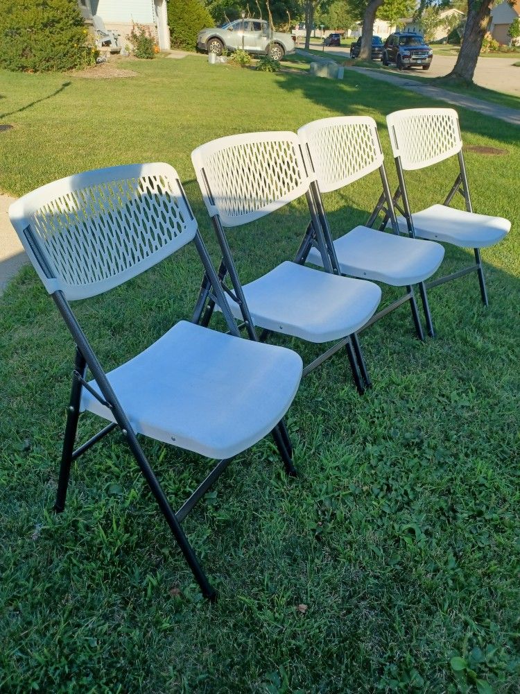 4- NEW XL Resin Foldable Chairs 