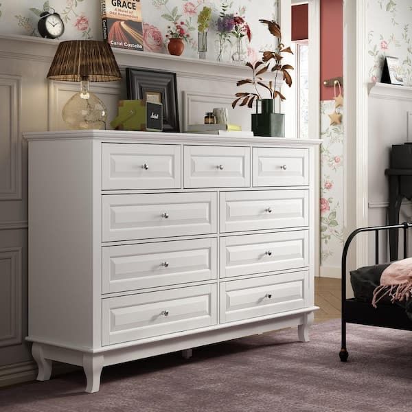 9-Drawer White Wood Dresser Storage Cabinet Modern Style 37 in. H x 55.1 in. W x 15.7 in. D Simply put, we sell furniture but our mission