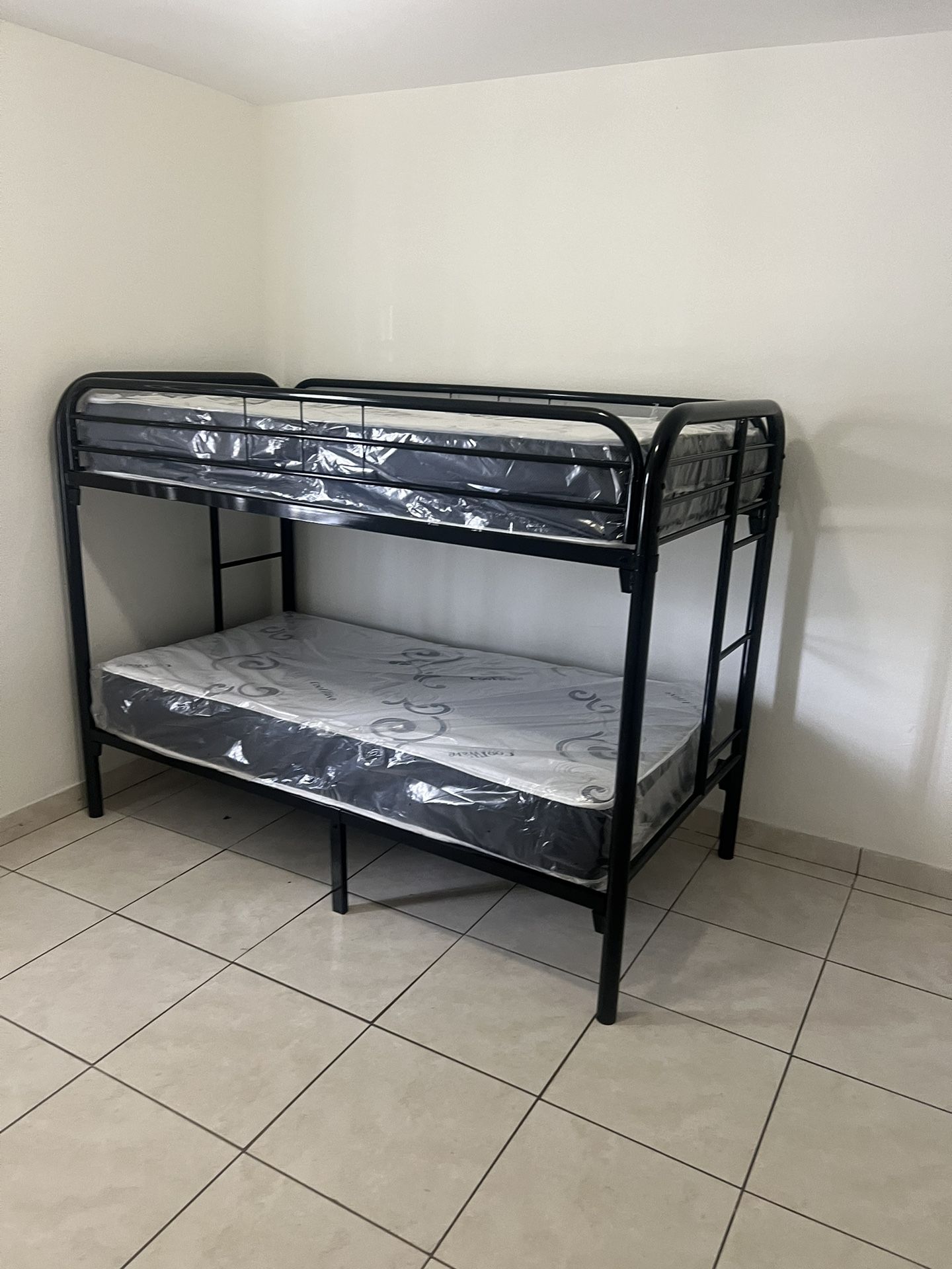 Twin over Twin bunk beds frame and free delivery in box with the mattress and 