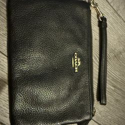 Coach wristlet.