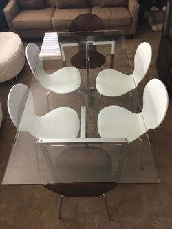 Glass dining table and 6 chairs