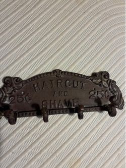 Vintage cast iron Barbershop haircut and shave wall hook rack