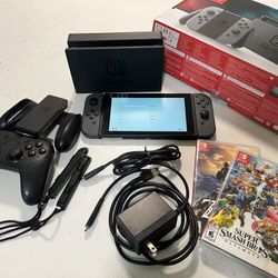 Nintendo Switch w/ extra controller + games